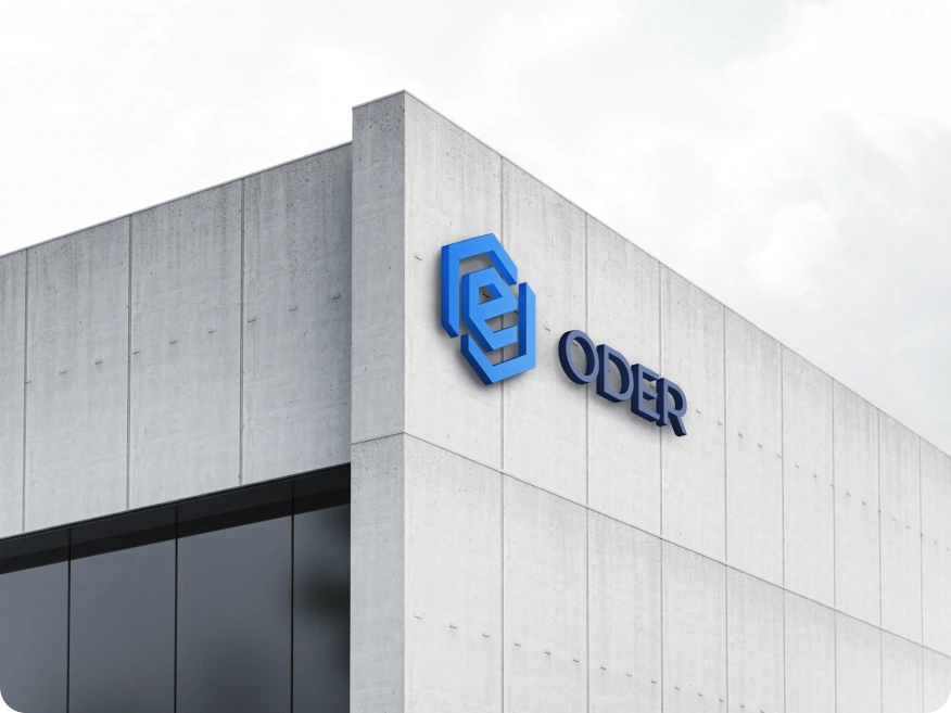 ODER blue dimensional logo and wordmark used as signage on a concrete office facade